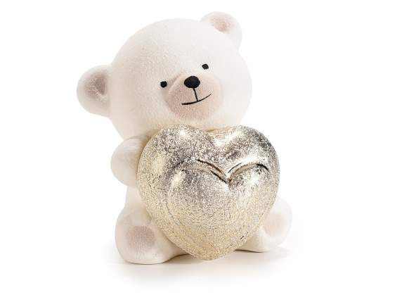 Teddy bear in matt porcelain with a metallic golden heart