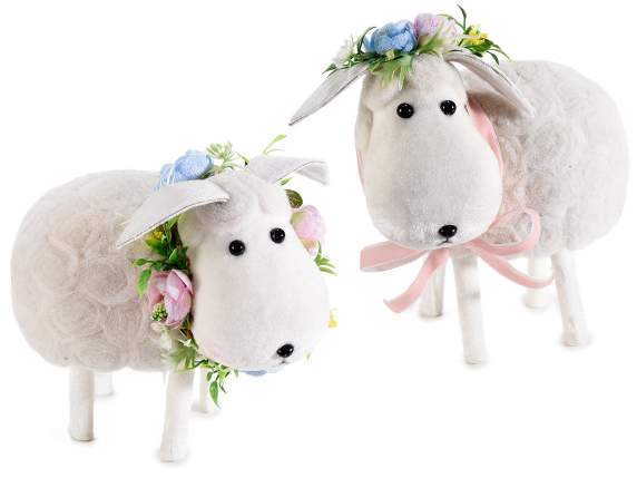 Sheep covered in boiled wool with artificial flowers