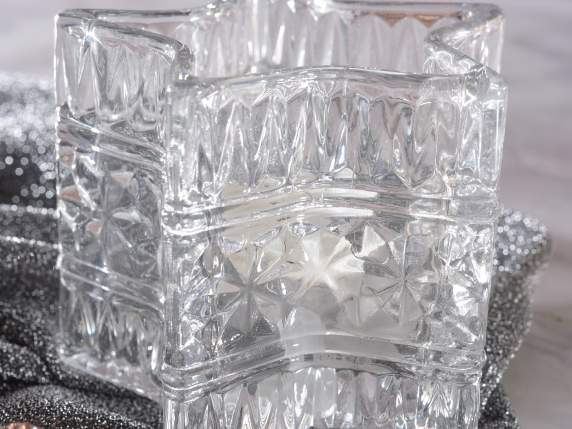 Star-shaped tealight holder in worked transparent glass