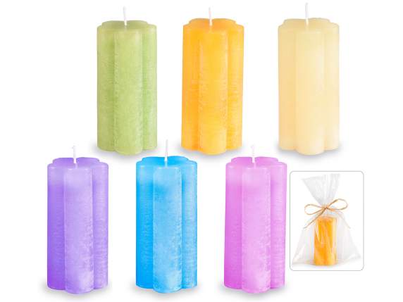 Colorful flower-shaped candle in individual packaging