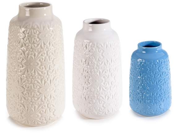 Set of 3 glossy porcelain vases with relief decorations