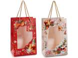 Bolsa/sobre de papel navideño con asas, ventana y etiqueta.