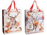 Bolsa/sobre grande de papel navideño con asas de satén.