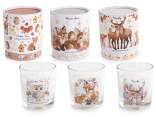 Bougie parfumée dans un pot en verre avec décorations de Noë
