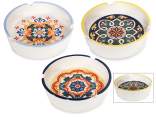 Ceramic ashtray with majolica decorations and colored edge