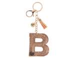 Charm / breloc litera B bronz cu strasuri si ciucuri