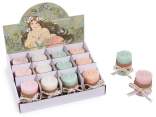 Colored candle shaped with bow
