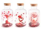 Glass jar decorated with heart sequins and LED lights