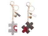 Llavero charm/rompecabezas con pedrería y colgantes