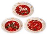 Round plate in glossy porcelain with Christmas decoration