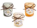 Scented candle in a glass jar with a bow