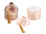 Scented candle in a glass jar with tassel