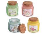 Scented candle in glass jar with cork stopper