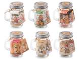 Scented candle in glass jar with handle and lid