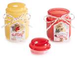 Scented candle in glass jar with pendant and tag