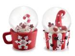 Snow globe with Christmas sweets, decorated resin base