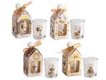 Vela perfumada en vaso de cristal con adornos navideños.