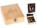 Wooden box with 4 sommelier accessories for wine in gift box