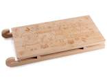 Wooden sled cutting board with Christmas engravings