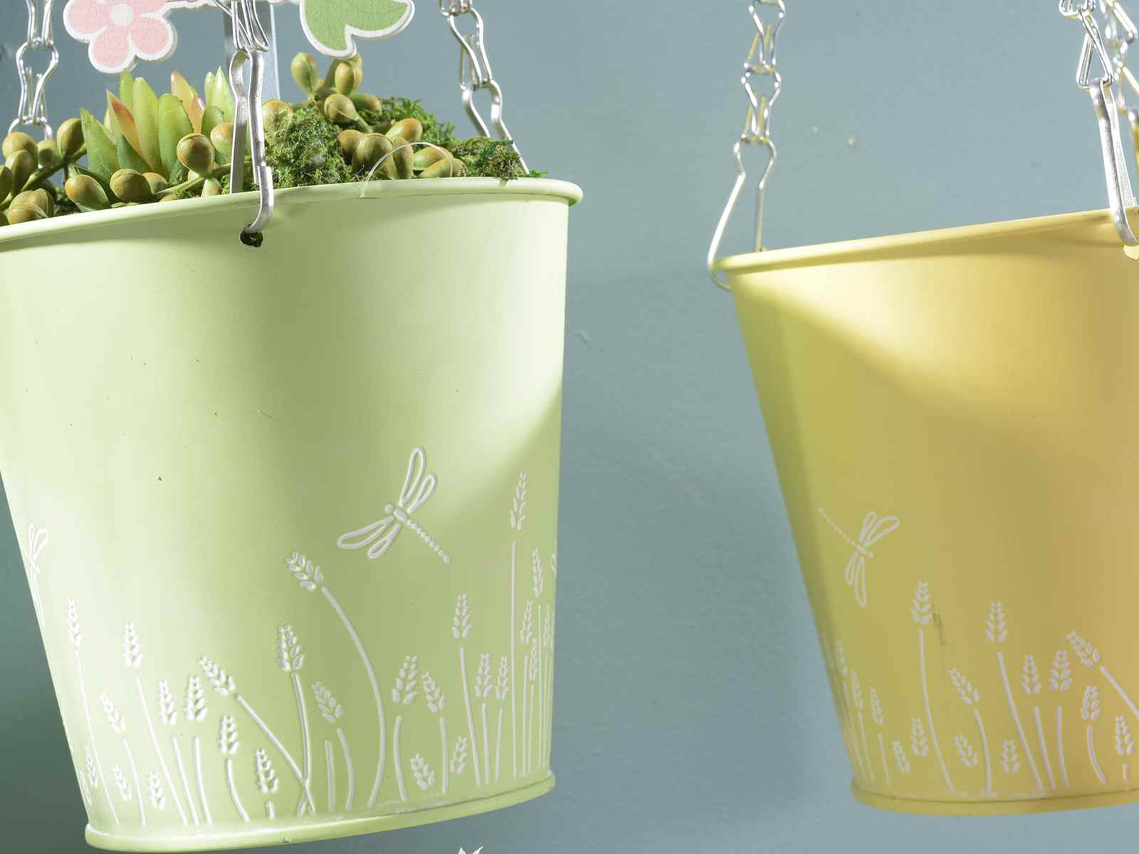 Metal hanging vase with basrelief floral designs (53.27.19) Art From Italy