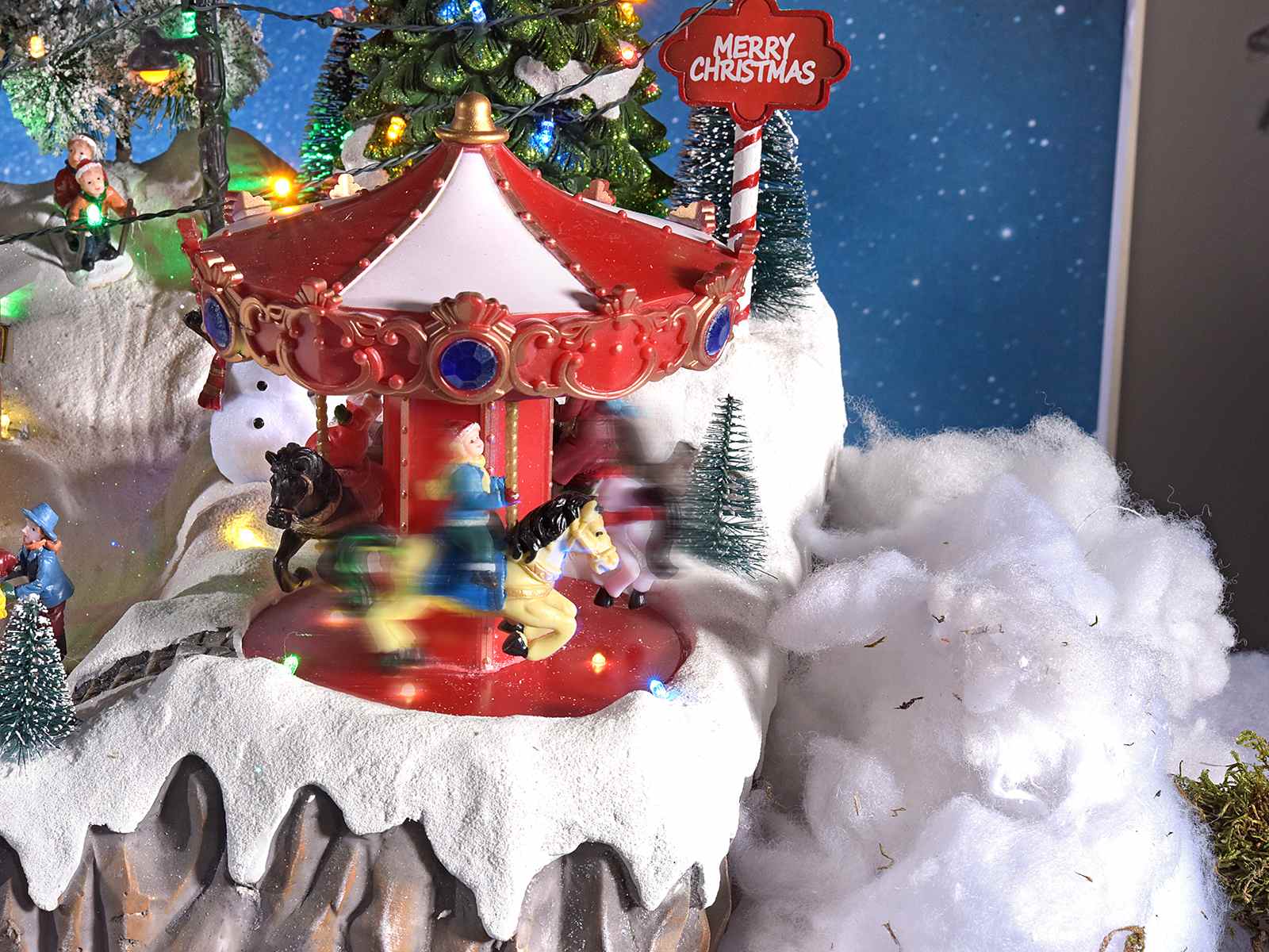 Park with resin carousels with multicolor lights, music and () -  Art From Italy