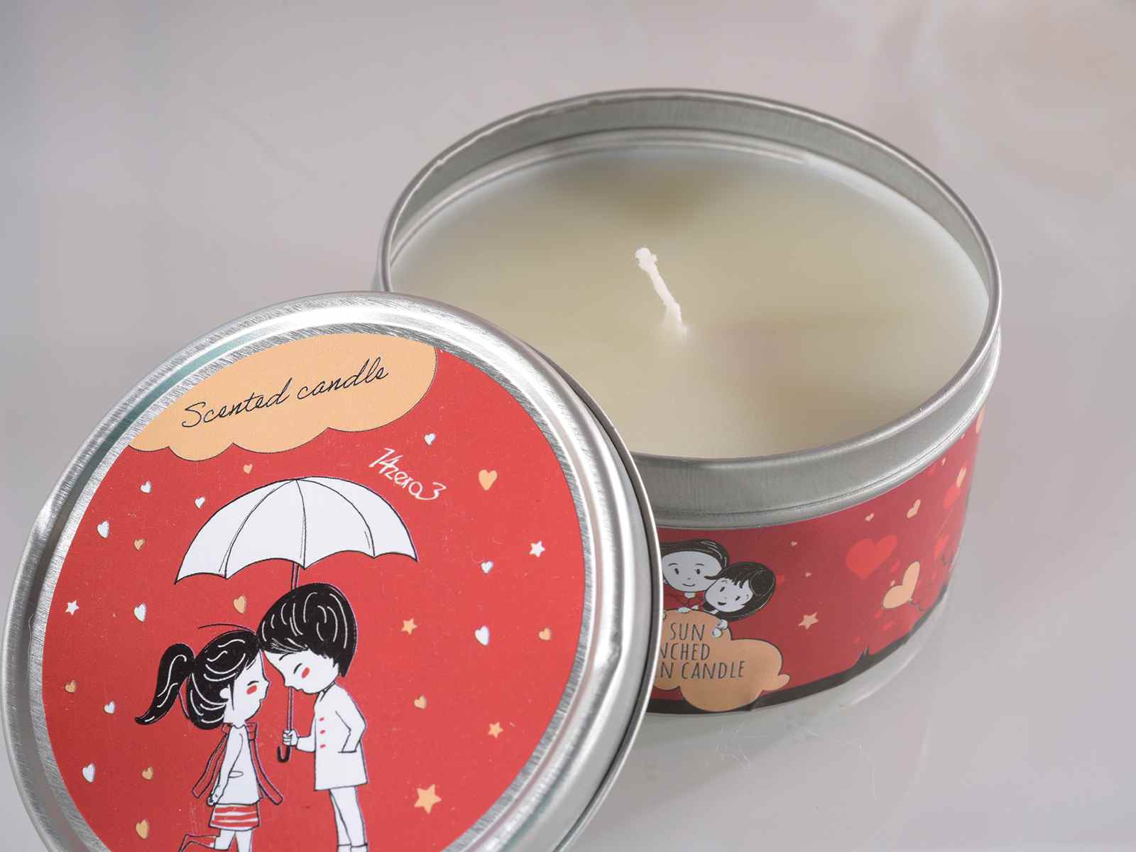 Bougie parfumée dans une boîte ronde en métal "In love" (14.15.27