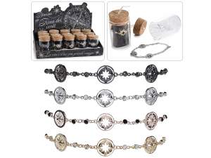 Brățară metalică Rose Wind într-o eprubetă de sticlă