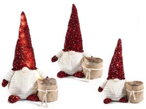 gros gnome de Noël avec manique