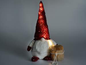 gros gnome de Noël avec manique