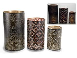 Carved metal candle holder