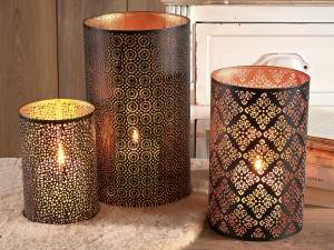Carved metal candle holder