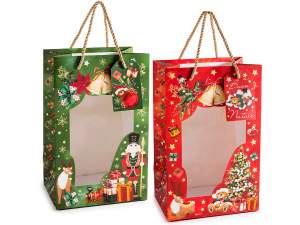 Bolsa/sobre de papel navideño con asas, ventana y etiqueta.
