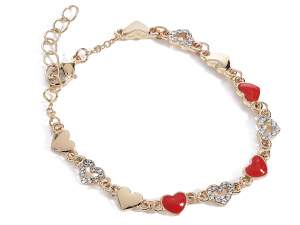 Metal bracelet with lacquered hearts and rhinestones in card