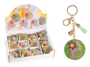 Breloque / porte-clés avec strass et lettres à pompon