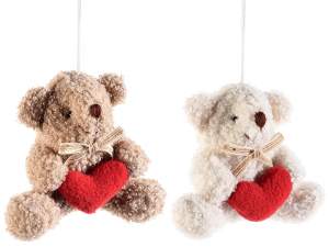 Plush bear with stuffed heart to hang