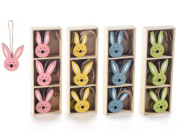 12 hanging bunnies in wood in display
