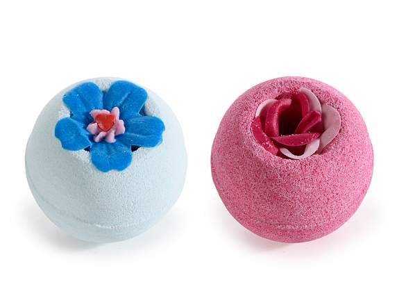 Perfumed bath bomb with small flowers in display