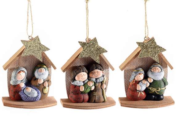 Belén de terracota con casa de madera y estrella colgante