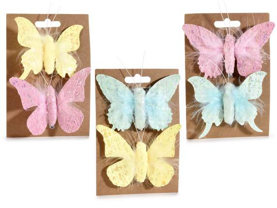 Blister avec 2 papillons en tissu coloré et plumes avec clip