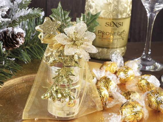 Glitzerstrauß mit Weihnachtsstern, goldenen Beeren und Deko