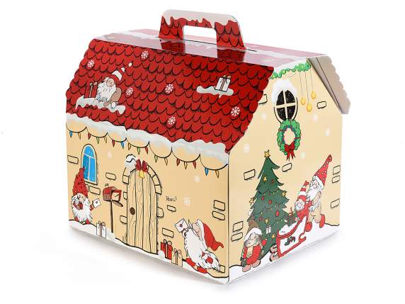 Boîte en carton avec une maison avec des décorations de Noël
