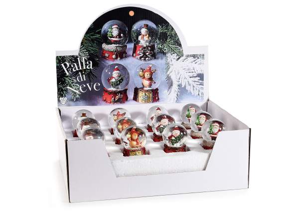 Bola de nieve con personaje navideño y base de resina.