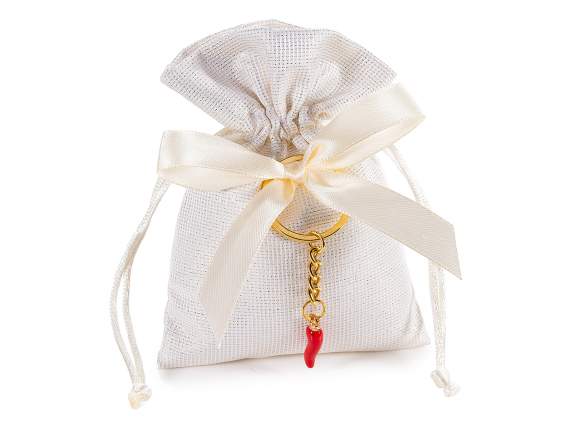 Bolsa de tela con llavero metálico de la suerte
