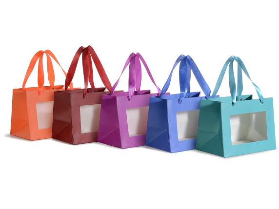 Bolsa pequeña de papel de colores con asas de tela y ventana