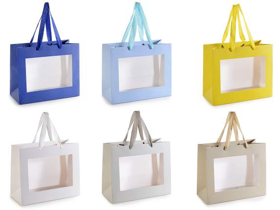 Bolsa grande de papel de colores con asas de tela y ventana