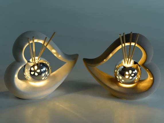 Corazón de porcelana con luz LED y varilla perfumada.