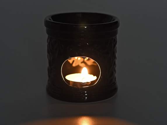 Brûle des essences en céramique noire avec des décorations e