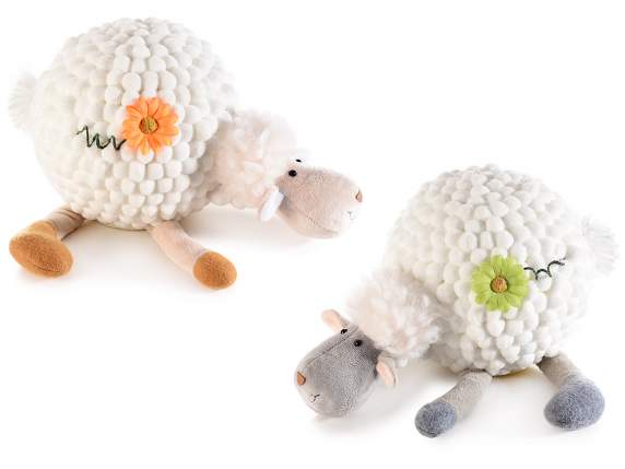 Mouton doux couché avec une marguerite colorée