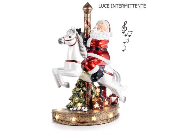 Caja de música Papa Noel en resina a caballo con luces y mús