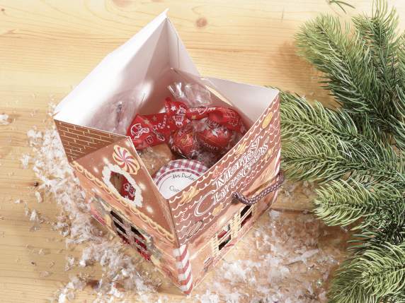 Caja de papel con forma de casa navideña con asa